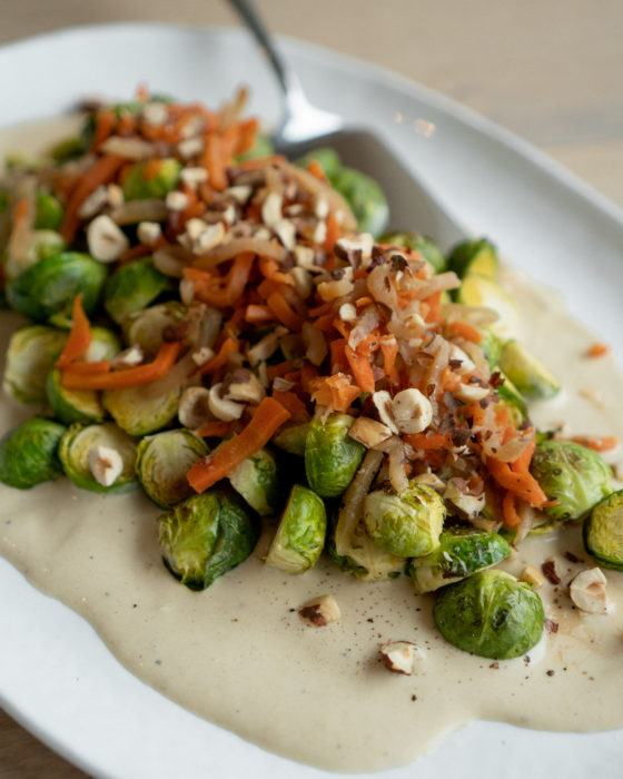 vegan roasted brussels sprouts with tahini sauce and dukkah